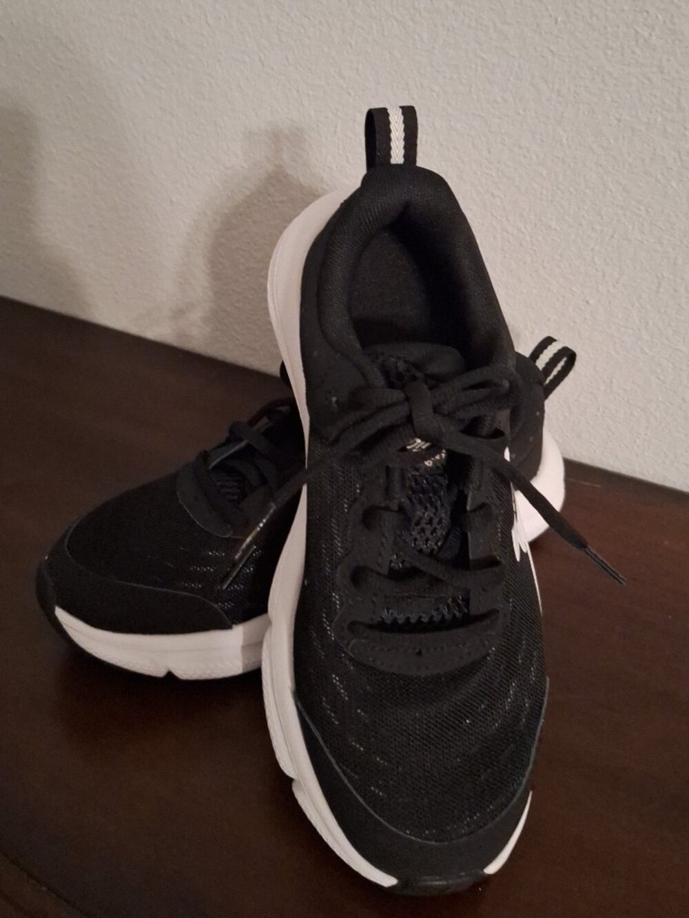 Kids black under armour shoes